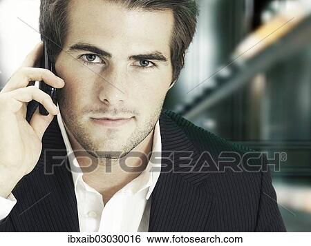Businessman on the phone View Large Photo Image Stock Photograph - Businessman on the phone. Fotosearch
