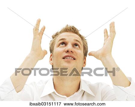 Businessman pleading with his hands raised View Large Photo Image Stock Photo - Businessman pleading with his hands raised. Fotosearch