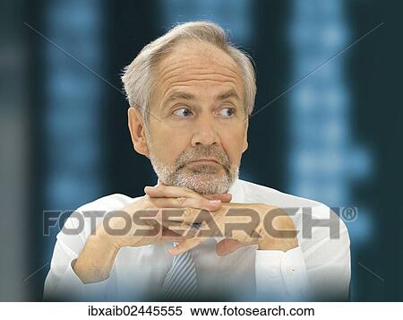 "Businessman, senior, thoughtful or worried expression at the stock exchange" View Large Photo Image Stock Photography - "Businessman, senior, thoughtful or worried expression at the stock exchange". Fotosearch