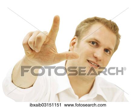 Businessman showing two fingers View Large Photo Image Stock Image - Businessman showing two fingers. Fotosearch