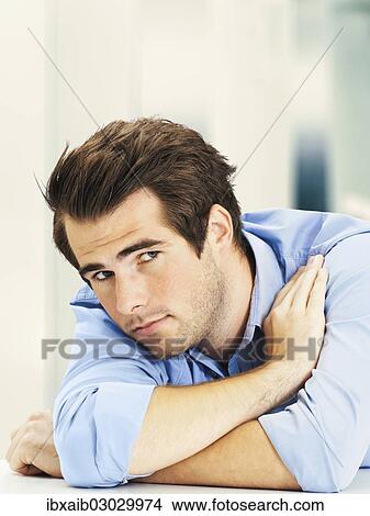 "Businessman, tired, relaxed" View Large Photo Image Picture - "Businessman, tired, relaxed". Fotosearch