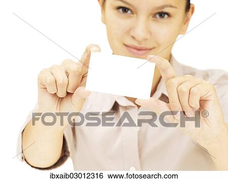 Stock Photograph - Businesswoman holding a business card. Fotosearch