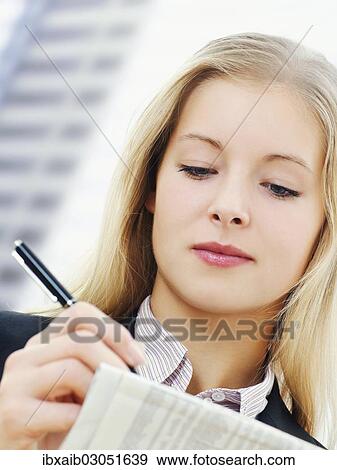 Businesswoman in an office View Large Photo Image Stock Photo - Businesswoman in an office. Fotosearch