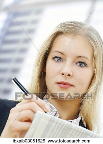 Stock Photography - Businesswoman in an office. Fotosearch
