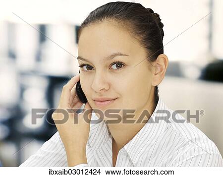 Businesswoman on the phone View Large Photo Image Picture - Businesswoman on the phone. Fotosearch