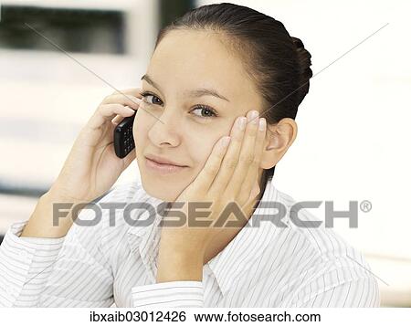 Stock Photograph - Businesswoman on the phone. Fotosearch