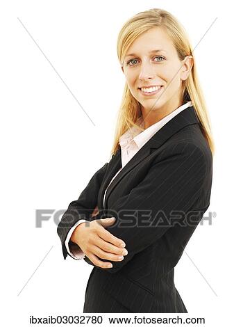 Stock Image - "Businesswoman, smiling with her arms crossed". Fotosearch