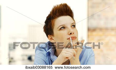 "Businesswoman with a punk hairstyle in an office, looking thoughtful" View Large Photo Image Stock Photography - "Businesswoman with a punk hairstyle in an office, looking thoughtful". Fotosearch