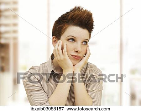 "Businesswoman with a punk hairstyle, dreamy" View Large Photo Image Stock Photo - "Businesswoman with a punk hairstyle, dreamy". Fotosearch