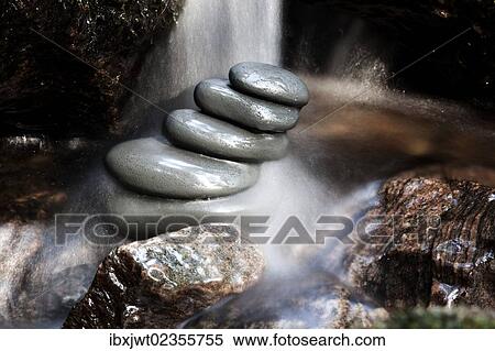 "Cairn, stack of basalt rocks in a mountain stream" View Large Photo Image Stock Photography - "Cairn, stack of basalt rocks in a mountain stream". Fotosearch