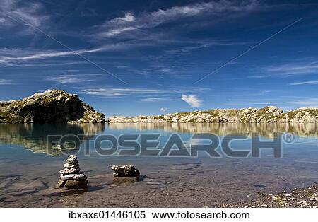 "Cairns in the Schottensee lake below the Pizol massif, Bad Ragaz, Heidi country, Canton St. Gallen, Switzerland, Europe" View Large Photo Image Stock Photography - "Cairns in the Schottensee lake below the Pizol massif, Bad Ragaz, Heidi country, Canton St. Gallen, Switzerland, Europe". Fotosearch