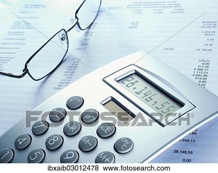 "Calculator, glasses and business documents" View Large Photo Image Stock Photo - "Calculator, glasses and business documents". Fotosearch