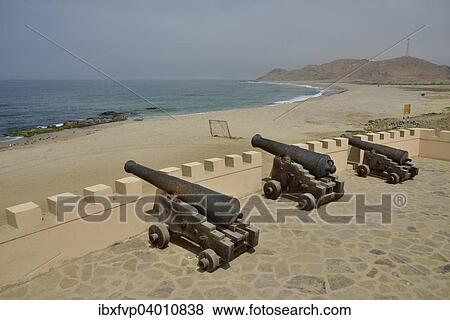 Stock Photo - "Cannons in front of the Fort of Mirbat, Dhofar Region, Orient, Oman, Asia". Fotosearch