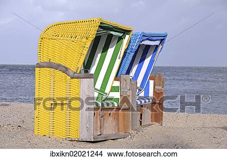 "Canopied beach chairs on the North Sea coast, Wyk auf Foehr, Schleswig-Holstein, Germany, Europe" View Large Photo Image Picture - "Canopied beach chairs on the North Sea coast, Wyk auf Foehr, Schleswig-Holstein, Germany, Europe". Fotosearch