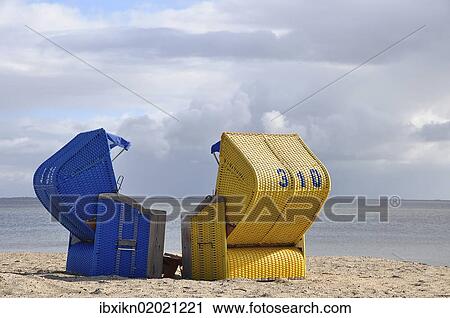 "Canopied beach chairs on the North Sea coast, Wyk auf Foehr, Schleswig-Holstein, Germany, Europe" View Large Photo Image Stock Image - "Canopied beach chairs on the North Sea coast, Wyk auf Foehr, Schleswig-Holstein, Germany, Europe". Fotosearch