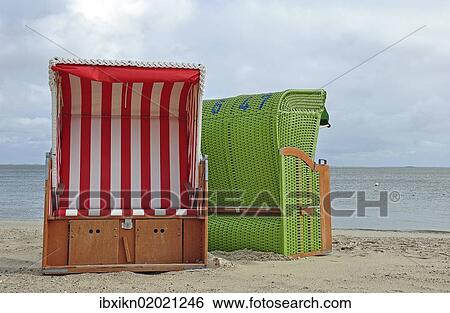 "Canopied beach chairs on the North Sea coast, Wyk auf Foehr, Schleswig-Holstein, Germany, Europe" View Large Photo Image Stock Photograph - "Canopied beach chairs on the North Sea coast, Wyk auf Foehr, Schleswig-Holstein, Germany, Europe". Fotosearch