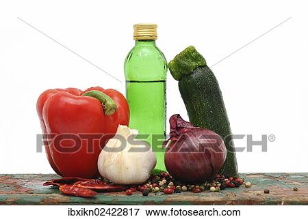"Capsicum, zucchini, garlic, onion and a bottle of oil" View Large Photo Image Stock Photo - "Capsicum, zucchini, garlic, onion and a bottle of oil". Fotosearch