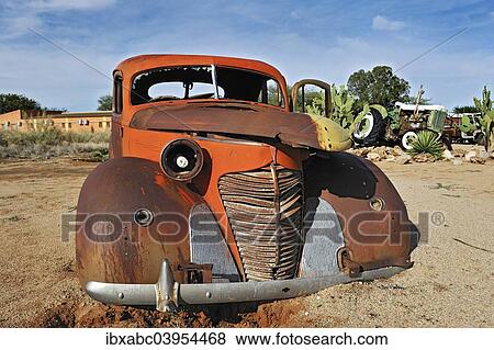 "Car wreck, Solitaire, historically Areb, since 1848 a small private settlement on the same named farm, Namib-Naukluft National Park, Namibia, Africa" View Large Photo Image Stock Photo - "Car wreck, Solitaire, historically Areb, since 1848 a small private settlement on the same named farm, Namib-Naukluft National Park, Namibia, Africa". Fotosearch
