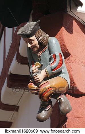Stock Photo - "Carved figure on the corner of a house, Karlstadt, Mainfranken, Lower Franconia, Franconia, Bavaria, Germany, Europe". Fotosearch