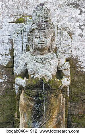 "Carved granite statue in the ritual bathing pool, Goa Gajah Elephant Cave, Bali, Indonesia, Asia" View Large Photo Image Stock Image - "Carved granite statue in the ritual bathing pool, Goa Gajah Elephant Cave, Bali, Indonesia, Asia". Fotosearch