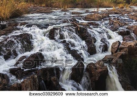 Stock Photo - "Cascades of Epupa Falls, Epupa, Kaokoland, Kunene Region, Namibia, Africa". Fotosearch