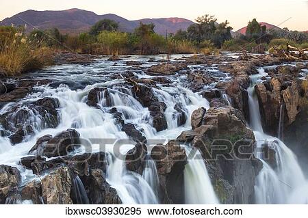 "Cascades of Epupa Falls Epupa, Kaokoland, Kunene Region, Namibia, Africa" View Large Photo Image Stock Photography - "Cascades of Epupa Falls Epupa, Kaokoland, Kunene Region, Namibia, Africa". Fotosearch