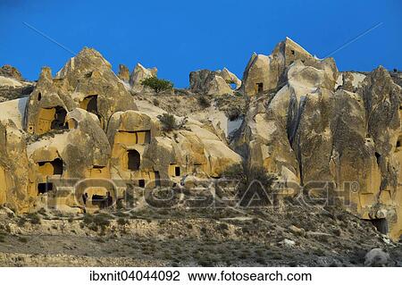 "Cave dwellings, tufa formations, Goreme National Park, Goreme, Nevsehir Province, Cappadocia, Turkey, Asia" View Large Photo Image Stock Image - "Cave dwellings, tufa formations, Goreme National Park, Goreme, Nevsehir Province, Cappadocia, Turkey, Asia". Fotosearch