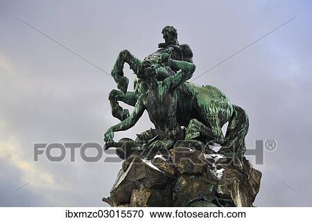 Stock Image - "Centaur Fountain in winter, inaugurated in 1890, by sculptor Rudolf Maison, Bahnhofsplatz, Fuerth, Middle Franconia, Bavaria, Germany, Europe". Fotosearch
