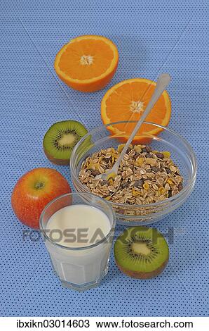 "Cereal or muesli, a glass of milk, a kiwi, an apple and an orange" View Large Photo Image Stock Image - "Cereal or muesli, a glass of milk, a kiwi, an apple and an orange". Fotosearch