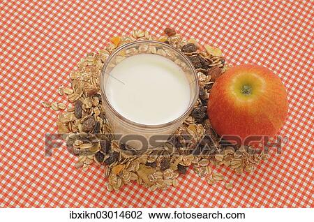"Cereal or muesli, a glass of milk and an apple" View Large Photo Image Stock Image - "Cereal or muesli, a glass of milk and an apple". Fotosearch