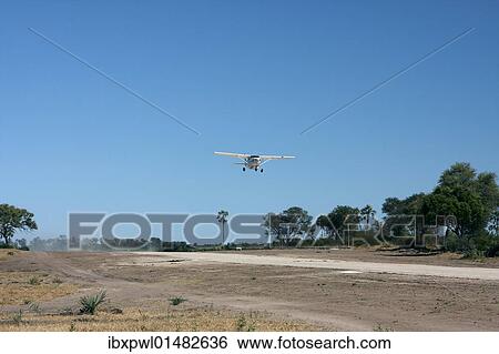 "Cessna in approach for a landing, the Okavango Delta, Botswana, Africa" View Large Photo Image Stock Photograph - "Cessna in approach for a landing, the Okavango Delta, Botswana, Africa". Fotosearch