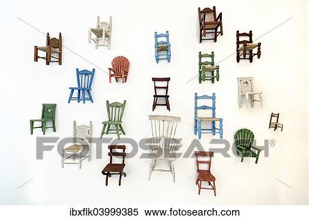 "Chairs, miniatures, wall decoration" View Large Photo Image Stock Photography - "Chairs, miniatures, wall decoration". Fotosearch