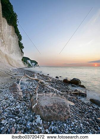 Stock Image - "Chalk cliffs at sunrise, Sassnitz, Rugen, Mecklenburg-Western Pomerania, Germany, Europe". Fotosearch