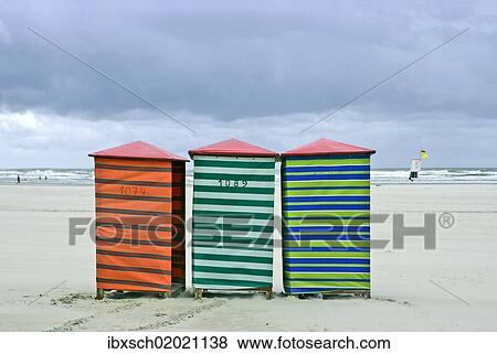 "Change cabins on a deserted beach of the North Sea at end of the holiday season, Juist, Lower Saxony, Germany, Europe" View Large Photo Image Stock Photo - "Change cabins on a deserted beach of the North Sea at end of the holiday season, Juist, Lower Saxony, Germany, Europe". Fotosearch