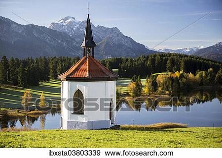 "Chapel at Hegratsrieder See lake on an autumn morning, Ostallgau, Bavaria, Germany, Europe" View Large Photo Image Stock Photo - "Chapel at Hegratsrieder See lake on an autumn morning, Ostallgau, Bavaria, Germany, Europe". Fotosearch