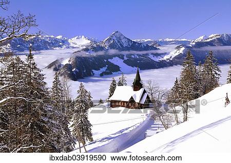 "Chapel in winter with view on the Hochflue and the Central Swiss Alps, Haggenegg, Canton of Schwyz, Switzerland, Europe" View Large Photo Image Stock Image - "Chapel in winter with view on the Hochflue and the Central Swiss Alps, Haggenegg, Canton of Schwyz, Switzerland, Europe". Fotosearch