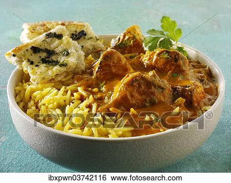 "Chicken Bhuna, Indian curry, pilau rice and naan bread" View Large Photo Image Stock Photograph - "Chicken Bhuna, Indian curry, pilau rice and naan bread". Fotosearch