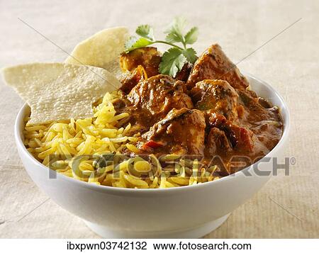 "Chicken Jalfrezie, pilau rice and papadums" View Large Photo Image Stock Image - "Chicken Jalfrezie, pilau rice and papadums". Fotosearch