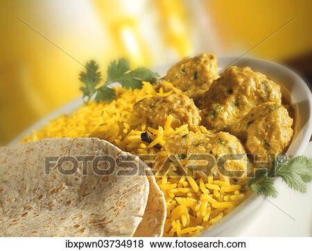 "Chicken Korma, Pilaf rice and Naan bread" View Large Photo Image Stock Photo - "Chicken Korma, Pilaf rice and Naan bread". Fotosearch