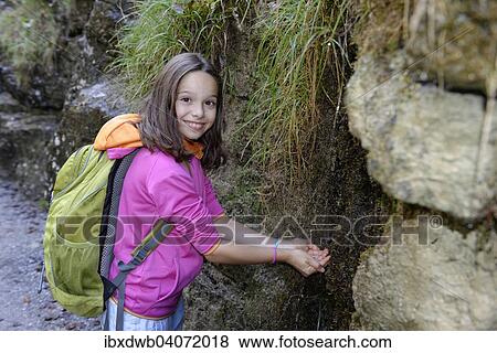 "Child getting water, hikers in the Giessenbachklamm gorge in Kiefersfelden, Inn Valley, Upper Bavaria, Bavaria, Germany, Europe" View Large Photo Image Stock Photo - "Child getting water, hikers in the Giessenbachklamm gorge in Kiefersfelden, Inn Valley, Upper Bavaria, Bavaria, Germany, Europe". Fotosearch