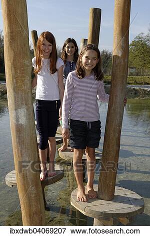 "Children at the Erlebnispark Wasser Fisch Natur adventure park, at Murner See lake, near Wackersdorf, Upper Palatinate Lake District, Upper Palatinate, Bavaria, Germany, Europe" View Large Photo Image Stock Photo - "Children at the Erlebnispark Wasser Fisch Natur adventure park, at Murner See lake, near Wackersdorf, Upper Palatinate Lake District, Upper Palatinate, Bavaria, Germany, Europe". Fotosearch