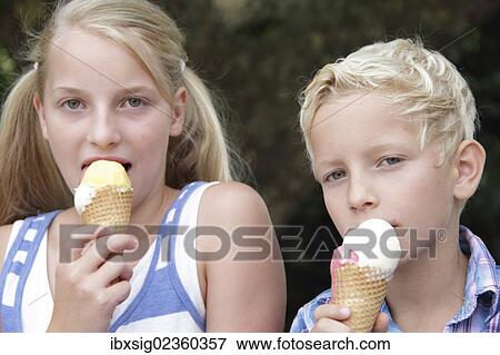 Children eating ice cream View Large Photo Image Stock Photo - Children eating ice cream. Fotosearch