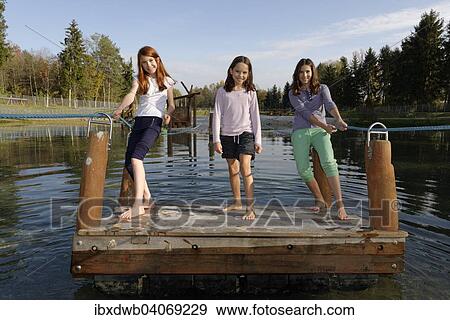 "Children riding a raft and exploring the Erlebnispark Wasser Fisch Natur adventure park, at Murner See lake, near Wackersdorf, Upper Palatinate Lake District, Upper Palatinate, Bavaria, Germany, Europe" View Large Photo Image Stock Photo - "Children riding a raft and exploring the Erlebnispark Wasser Fisch Natur adventure park, at Murner See lake, near Wackersdorf, Upper Palatinate Lake District, Upper Palatinate, Bavaria, Germany, Europe". Fotosearch