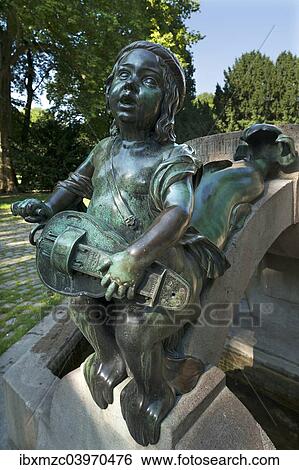 "Child's sculpture with musical instrument and fish fin on Minnesangerbrunnen fountain, art nouveau, 1905, Rosenaupark, Nuremberg, Middle Franconia, Bavaria, Germany, Europe" View Large Photo Image Stock Photograph - "Child's sculpture with musical instrument and fish fin on Minnesangerbrunnen fountain, art nouveau, 1905, Rosenaupark, Nuremberg, Middle Franconia, Bavaria, Germany, Europe". Fotosearch