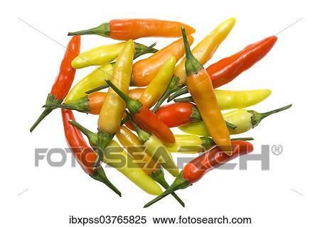 Stock Photography - "Chili peppers, various stages of ripeness, yellow, orange, red". Fotosearch
