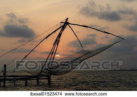 "Chinese fishing net at sunset, Kochi, Kerala, India, Asia" View Large Photo Image Picture - "Chinese fishing net at sunset, Kochi, Kerala, India, Asia". Fotosearch