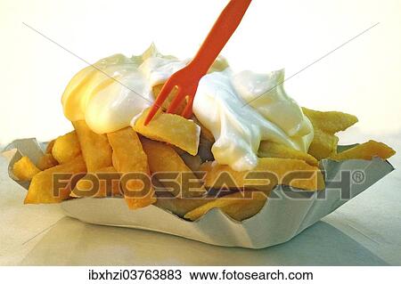 Chips or French fries with mayonnaise View Large Photo Image Stock Image - Chips or French fries with mayonnaise. Fotosearch