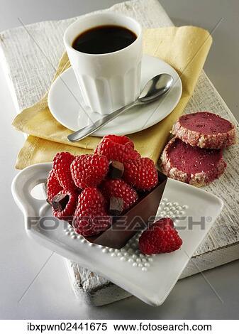 Chocolate cake filled with chocolate truffle and topped with fresh raspberries View Large Photo Image Stock Photography - Chocolate cake filled with chocolate truffle and topped with fresh raspberries. Fotosearch