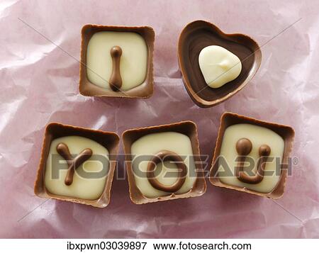 Stock Photo - "Chocolates forming the words """"I love you""""". Fotosearch
