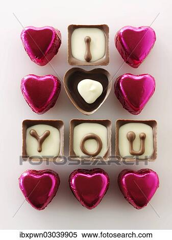 "Chocolates forming the words """"I love you""""" View Large Photo Image Stock Photography - "Chocolates forming the words """"I love you""""". Fotosearch